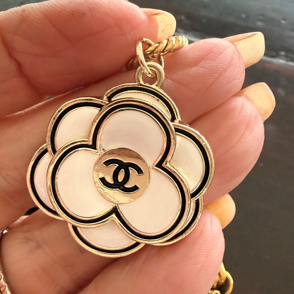 Chanel EUC Gold Tone bracelet
Camellia Enamel 3D charm on 7” 
Stainless Figaro - Picture 5 of 9